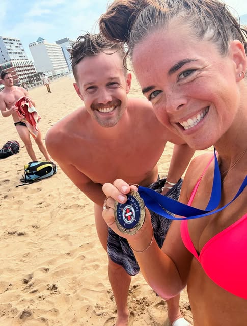 Beach finish with medal
