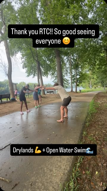 The tribe warming up with drylands before an open water swim