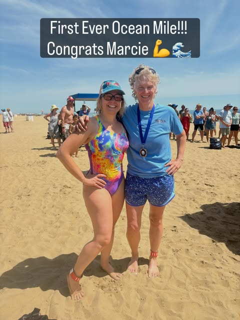 Athlete celebrating her first ocean mile